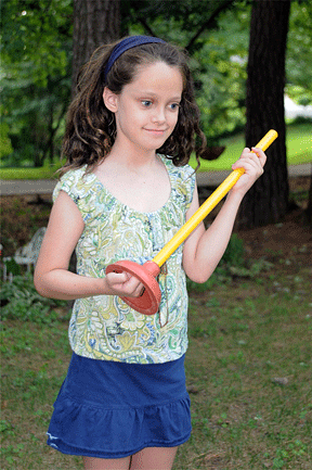 Kendra and her new plunger. Read "Dad, Where's the Plunger"