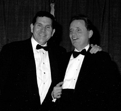 Allen Harris stands with his hand on Presidewnt Maurer's shoulder at the banquet.