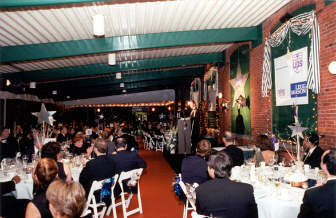 The skydeck is filled with diners seated at their tables at the beginning of dinner.