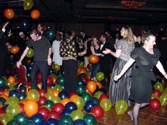 Guests took to the dance floor as balloons drifted down. 