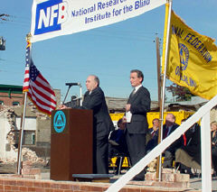Carl Jacobsen (at the podium) and Dr. Maurer