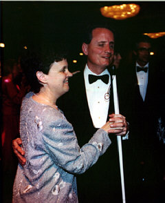 Despite Mrs. Maurer's broken ankle, she and President Maurer enjoy a dance together.