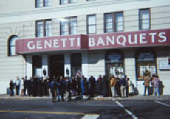 The crowd gathered at the plaque site as seen from across the street.