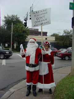 Santa and Mrs. Claus joined our protest against NAC.