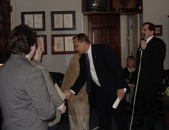 Congressman Jim Nussle greets each member of the NFB of Iowa delegation.  Allen and Joy Harris (standing right) wait their turn.