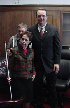Ruth Swenson (left), president of the NFB of Arizona, and Dan Duffy meet with Congressman Trent Franks