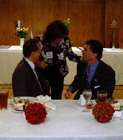 Dr. Betty Zaborowski (center) has the attention od Governor Ehrlich (right) and President Maurer.