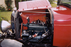 With hood up the entire engine of the rebuilt Model A is visible.