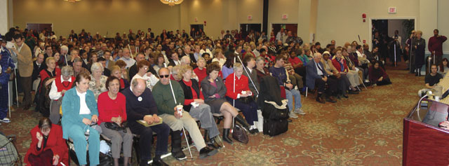 The Columbia Room in the Holiday Inn Capitol at the start of the gathering-in meeting on Sunday afternoon, February 1, 2004.  If anything, the foyer of the meeting room was even more densely packed.