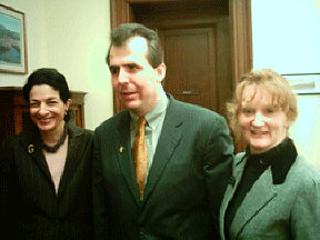 Senator Olympia Snowe of Maine talks in her office with James McCarthy, NFB director of governmental affairs, and Cindy Haley, president of the Maine Organization of Parents of Blind Children.