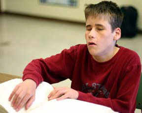 Andrew Nantz reading Braille