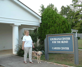 Julie Russell of New Orleans and her guide dog Lillith at the Louisiana Center for the Blind.