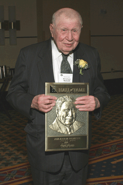 Dr. Abraham Nemeth displays his plaque at the Hall of Fame induction 