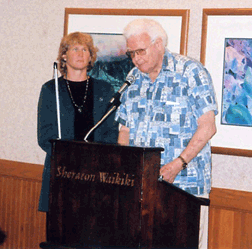 Dr. Floyd Matson addresses the Hawai�i convention while Katie Keim looks on.