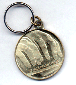 Braille coin key chain