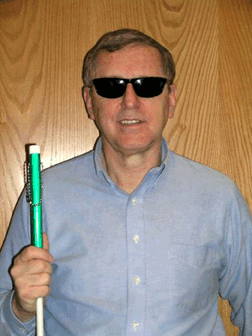 Ray Martin poses with his cane.