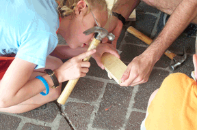 Allison VanEtten (NJ) is pictured here using a hammer in NFB Camp. 