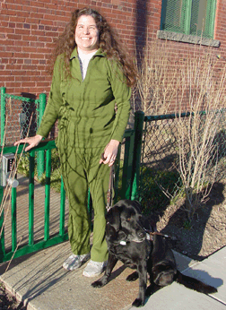Melissa Riccobono and her guide dog Fanta are pictured beside the relief area in front of the NFB Jernigan Institute.