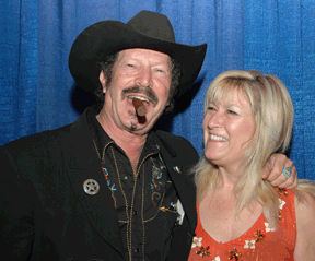 Kinky Friedman and a colleague on the convention platform