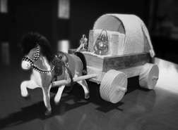 Decorative covered wagon with lantern