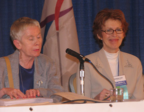 Sharon Maneki, chairperson of the Resolutions Committee, and Marsha Dyer, committee secretary, on the platform during the Friday afternoon Convention session