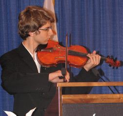 Allen Bailey playing his violin