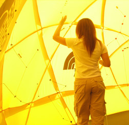Chrystal Wu from China, living this year in Maryland, examines stars and constellations inside a tactile astronomy dome.