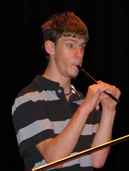 Student Nick Reams (Tennessee) plays an Irish jig on a penny whistle during the Youth Slam Showcase of Talent.
