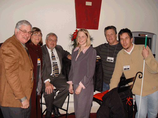 Conference participants socialize at the Illusions reception on Wednesday evening. Pictured left to right are Pat Byrnes, Lorinda Riddle, Richard Davis, Shawn Mayo, Jeffrey Thompson, and Zacharia Ellingson.