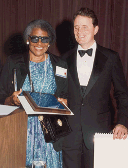 Doris Johnson is pictured here with President Maurer after receiving the Jacobus tenBroek Distinguished Service Award at the 1994 Convention.