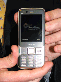 The knfbReader Mobile held in a man�s hand