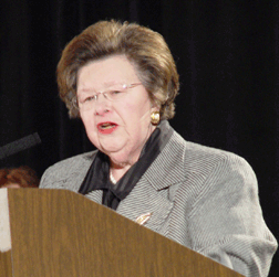Maryland Senator Barbara Mikulski speaks at the podium.