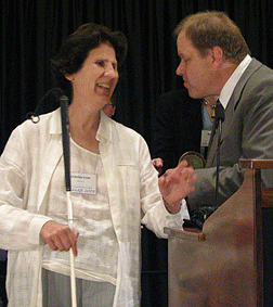 Gary Wunder congratulates Debbie Stein.