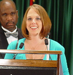Leslie Penko addresses the 2008 banquet audience as Anil Lewis looks on.