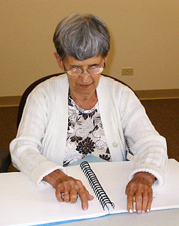 Marie Dambrosky, eighty-nine, reads Braille. She is currently the oldest Braille student in the program.
