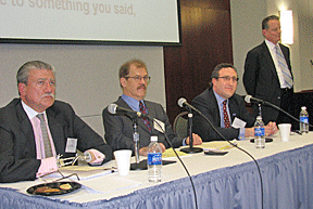 Robert Burgdorf, John Kemp and Andrew Imparato make up panel IV. Dr. Maurer stands to their right.