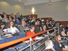 Conference attendees at a seminar session in the Utah auditorium of the Jernigan Institute