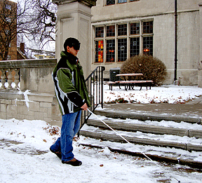 Harrison Hoyes returning to the center from his 5.6-mile walk in the snow