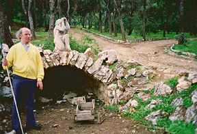 Jim Nyman stands outside an archeological site that may possibly be the remnants of the prison cell where Socrates was forced to drink a cup of hemlock.
