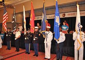Members of the National Guard post the colors.