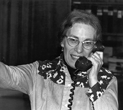Hazel tenBroek talks on the telephone in the Berkeley office.