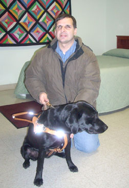 Dennis Farro and his guide dog Tara