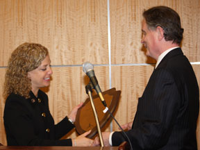 President Maurer presents a distinguished legislative service award to Representative Debbie Wasserman Schultz.