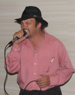 Victor Funck of Marietta, Georgia, emceed Karaoke Night in 2007, kicking it off with his rendition of "Wait till the Midnight Hour.�