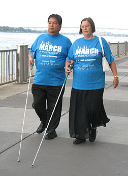 Curtis and Peggy Chong walk in the 2009 March for Independence.