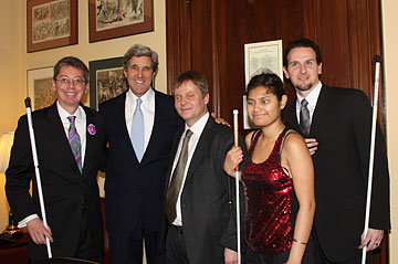 Federationists pose with Senator John Kerry after presenting him with our award. Pictured left to right are John Par�, John Kerry, NFB of Massachusetts President Mika Pyyhkala, Selena Sang, and Jesse Hartle.