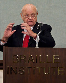 Kurt Cylke addresses an audience at the Braille Institute.