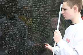Chris Nusbaum checks out the Vietnam Veterans Memorial.