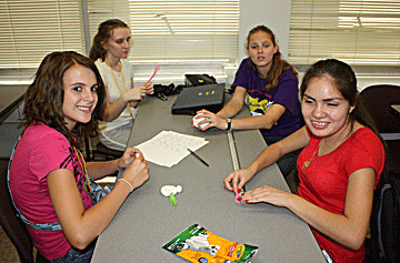 Students use modeling clay.