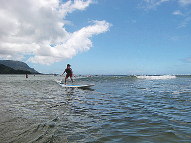 Vejas riding a wave